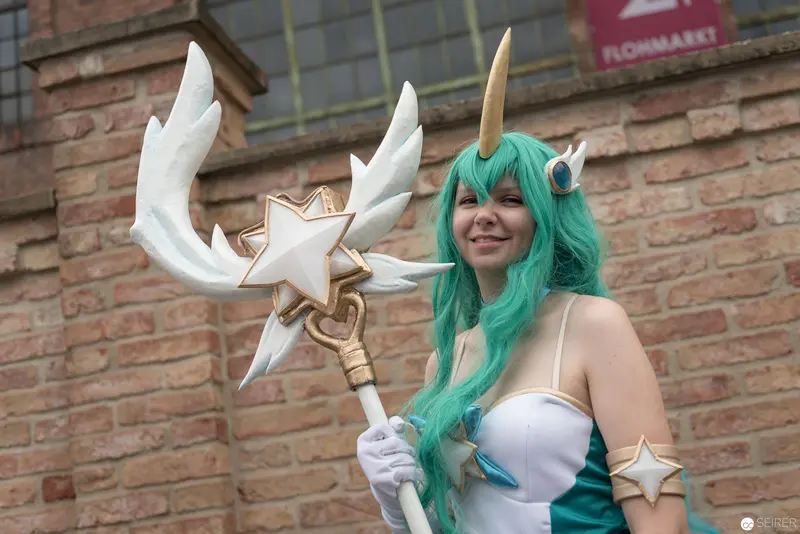 Cosplayer with Star-Shaped Staff at AniNite 2018 Anime Convention