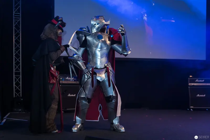 AniNite 2018: Cosplayers in Metallic Armor Performing on Stage