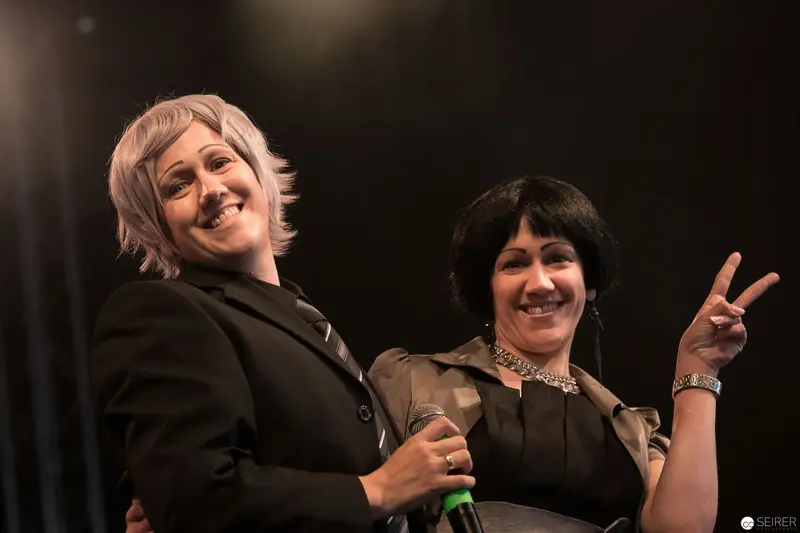 Joyful Performers on Stage at AniNite 2018 Music Event
