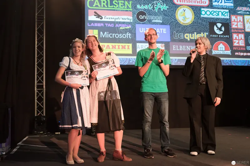 AniNite 2018 Award Ceremony: Participants Honored on Stage with Sponsor Logos
