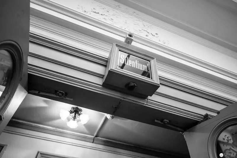 Architectural Detail of Vintage Signage in Monochromatic Interior Setting