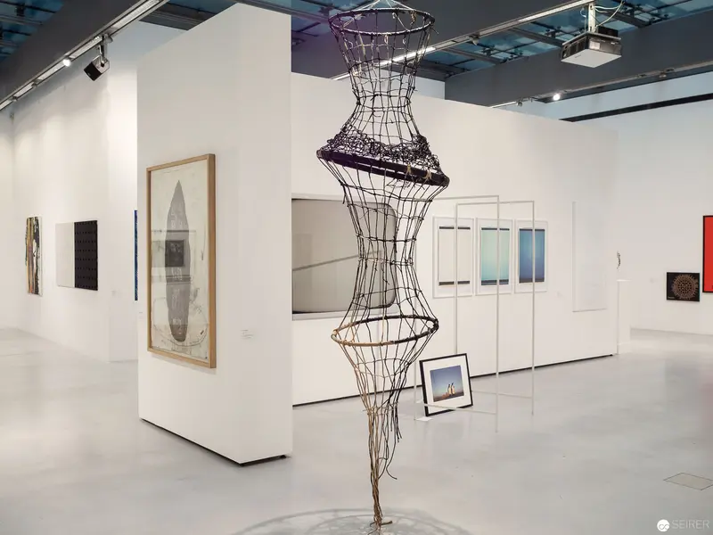 Wire Sculpture Suspended in White Gallery Space During "Die 90er Jahre" Exhibition