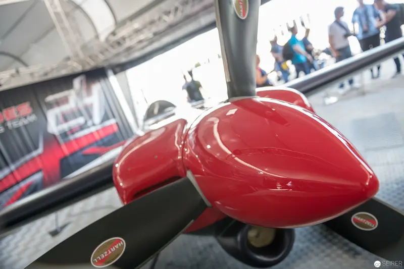 Red Bull Air Race Close-up of Glossy Propeller Cone in Intense Crimson
