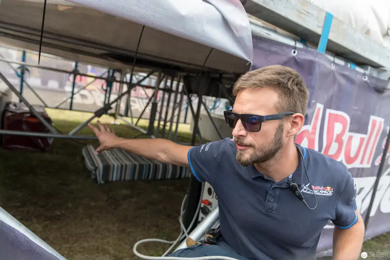 Red Bull Air Race Technician in Sunglasses Preparing Aircraft Mechanics
