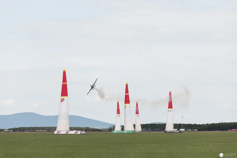 Red Bull Air Race: Precision Aircraft Navigating Between Distinctive Red and White Pylons