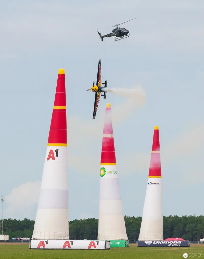 Red Bull Air Race Aerial Spectacle with Competitive Stunt Plane Navigation