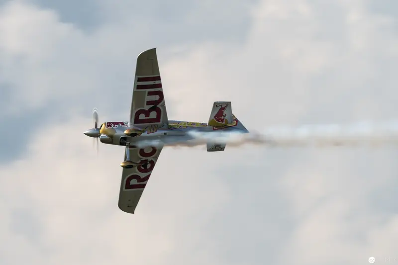Red Bull Air Race Stunt Plane Executing Precision Aerobatic Maneuver
