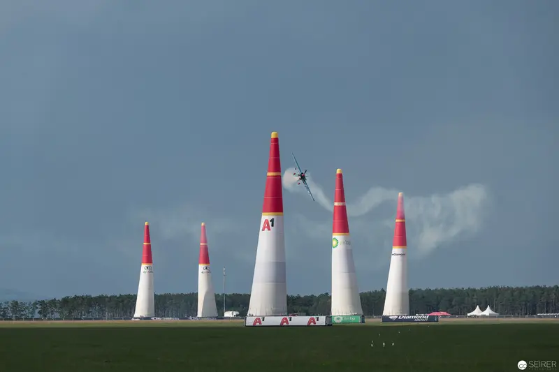 Red Bull Air Race Pylons with Aircraft Navigating Precision Aerial Course