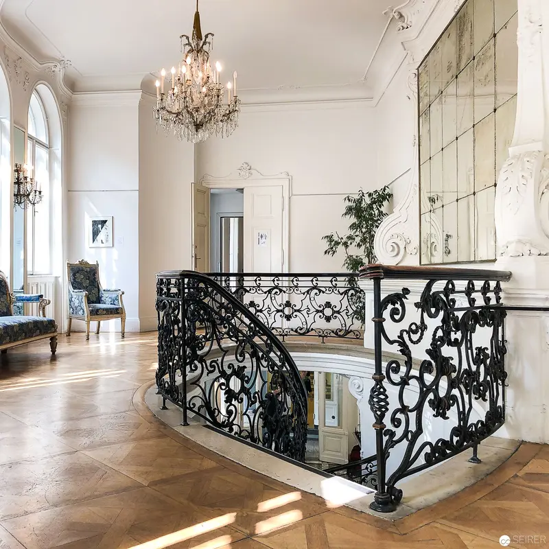 Ornate Parisian Interior with Wrought-Iron Staircase and Crystal Chandelier at Open House Vienna 2018