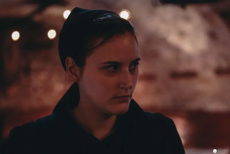 Nesterval Theater Performance "Das Dorf": Intense Profile in Dramatic Lighting