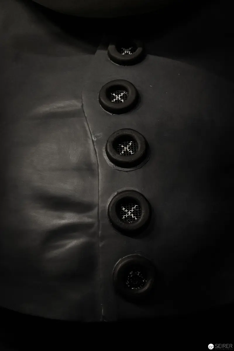 Black Fabric Detail: Vintage Button Arrangement in Monochrome