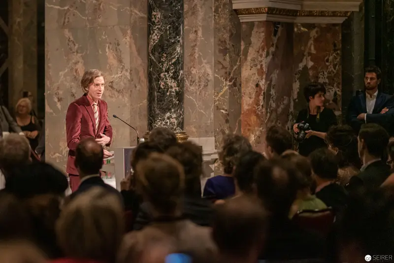 Wes Anderson Speaking at Kunsthistorisches Museum Wien in Burgundy Suit