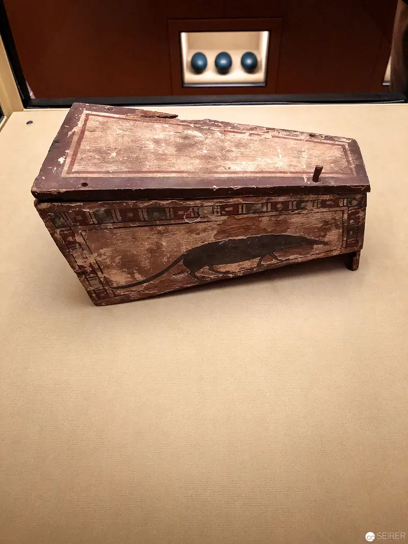 Aged Wooden Container with Weathered Surface and Distinctive Angular Placement