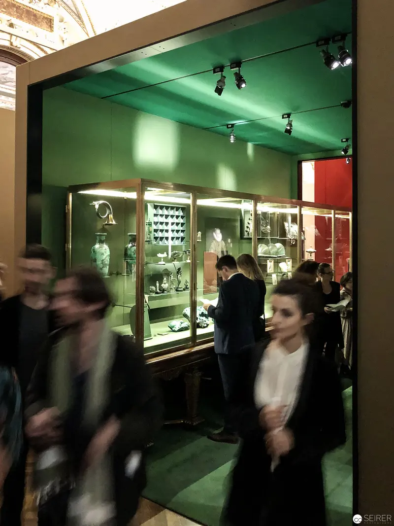 Museum Gallery Visitors Amid Green-Tinted Kunsthistorisches Museum Display