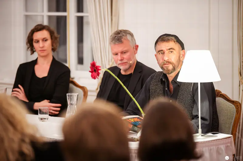 Arne Dahl's Book Reading at Buch Wien 2018: Three Authors in Contemplative Pose