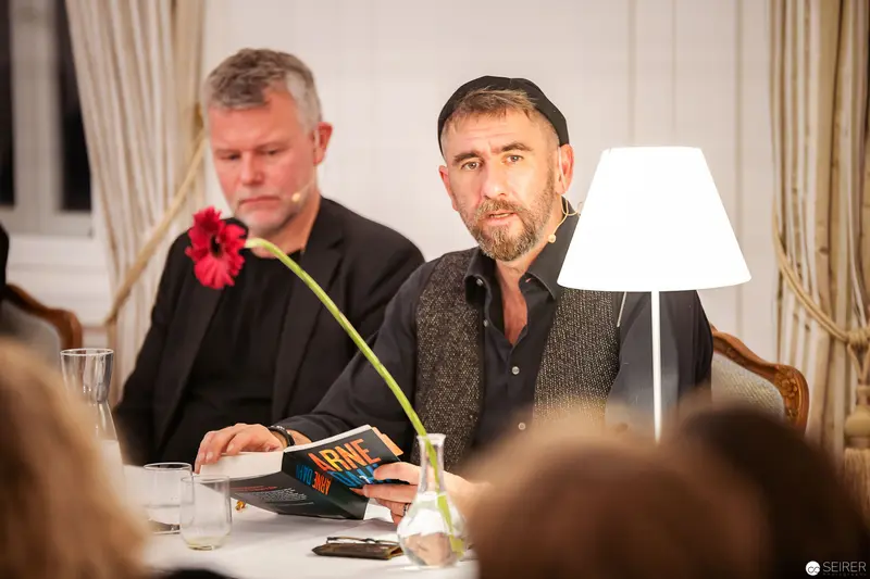 Arne Dahl's Book Reading at Buch Wien 2018: Two Authors in Contemplative Moment