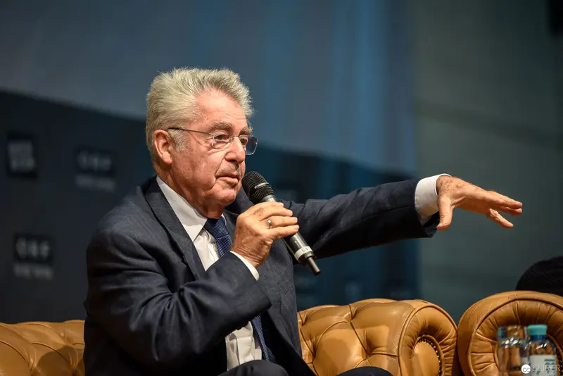Heinz Fischer, Former Austrian President, Speaking at Public Event with Gesture