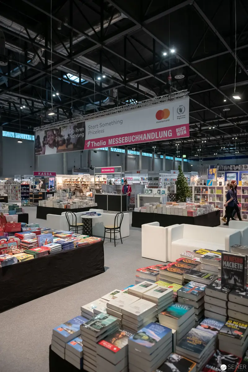 Book Fair Interior with Diverse Publications at Trade Exhibition Stand