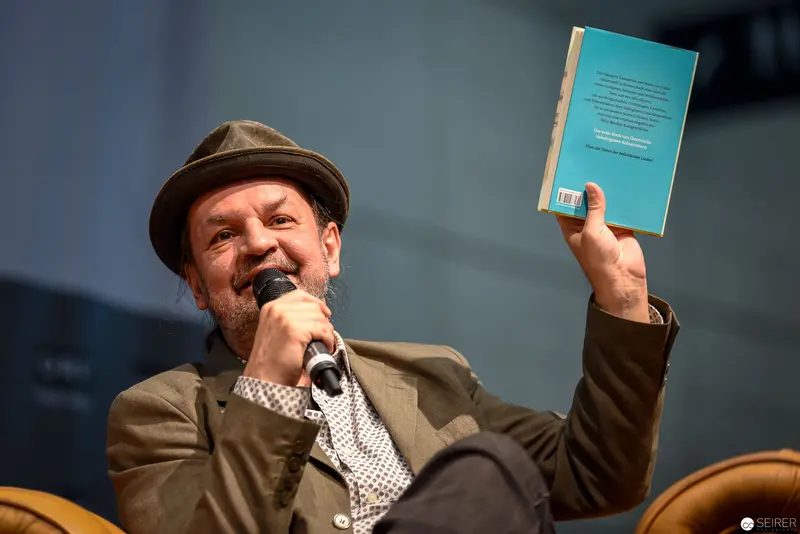 Bernd Flessner Presenting "Der kleine Major Tom" at Book Event