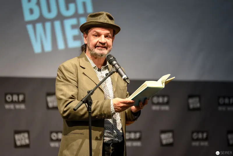 Bernd Flessner Presenting "Der kleine Major Tom" at Buch Wien Event
