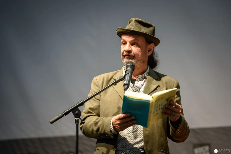 Bernd Flessner Presenting "Der kleine Major Tom" at Literary Reading Event