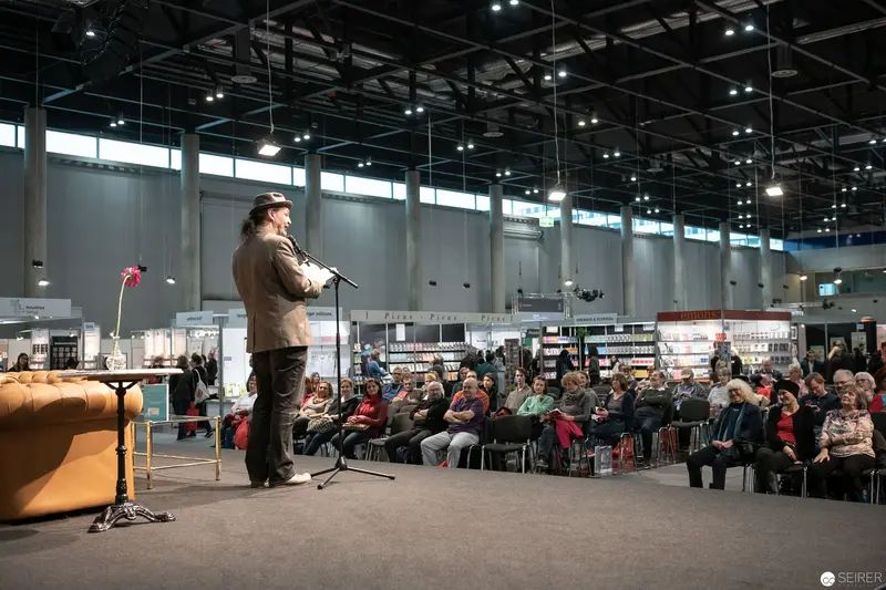 Bernd Flessner Presenting "Der kleine Major Tom" at Buch Wien Event