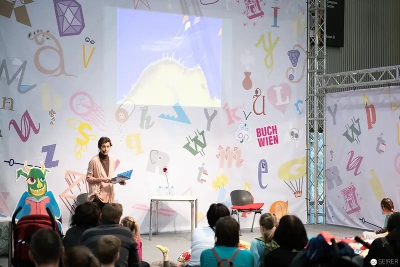 Bernd Flessner Presenting "Der kleine Major Tom" at Buch Wien Literary Event
