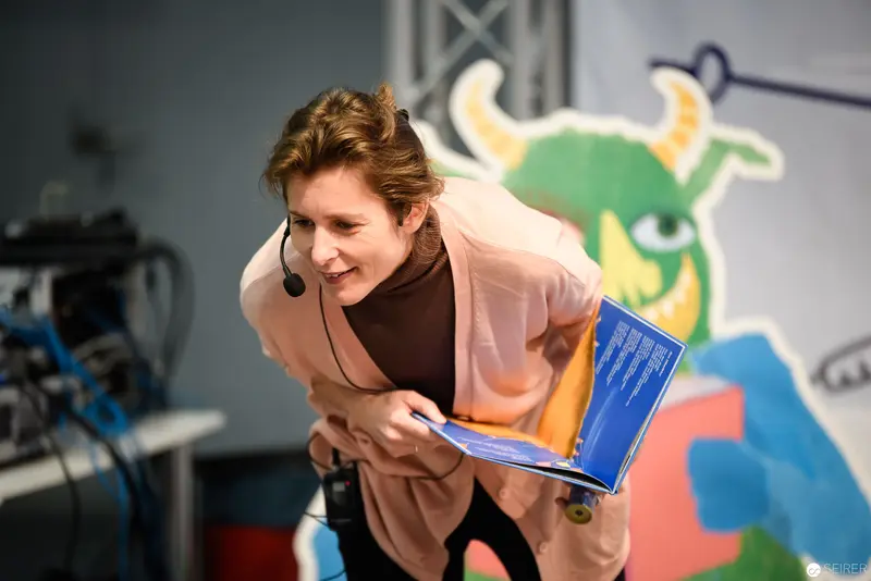 Animated Presenter Engaging with Digital Media during Book Presentation