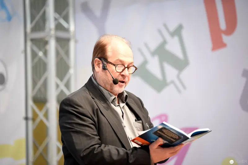 Bernd Flessner Presenting "Der kleine Major Tom" at Buch Wien Event