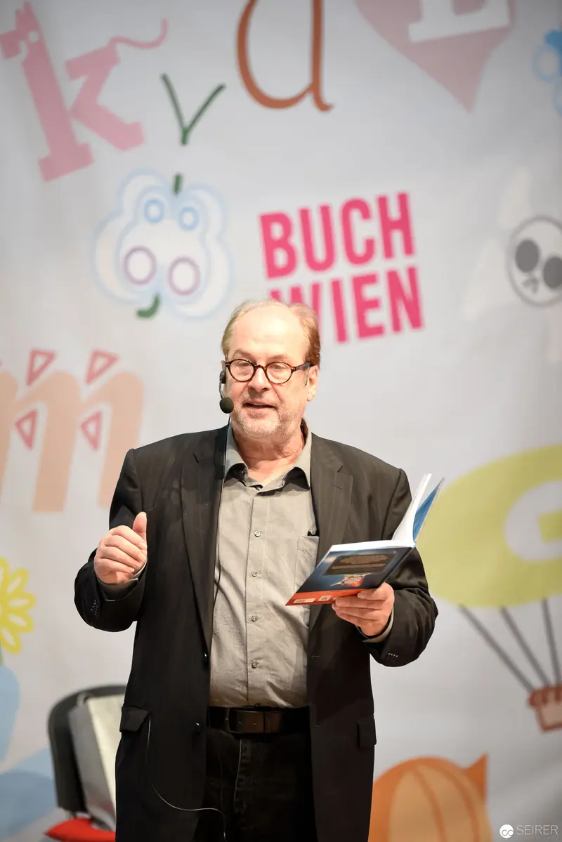 Bernd Flessner Presenting "Der kleine Major Tom" at Buch Wien Event