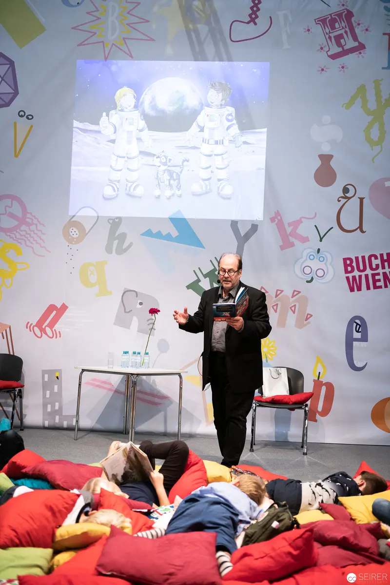 Bernd Flessner Presenting "Der kleine Major Tom" at Buch Wien Literary Event
