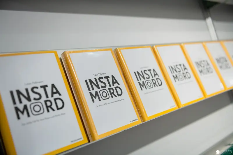 Book Display of Insta Mord Publishing Design with Yellow Borders