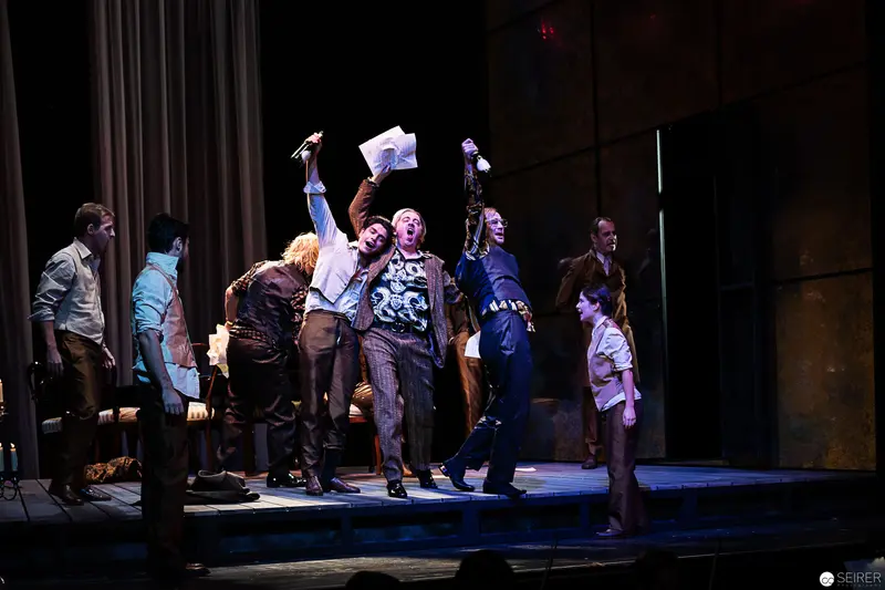 Theatrical Ensemble in Dynamic Pose during Lakrimosa Performance