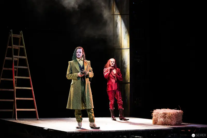 Lakrimosa and Bustorius on Theatrical Stage with Ladder and Hay Bale