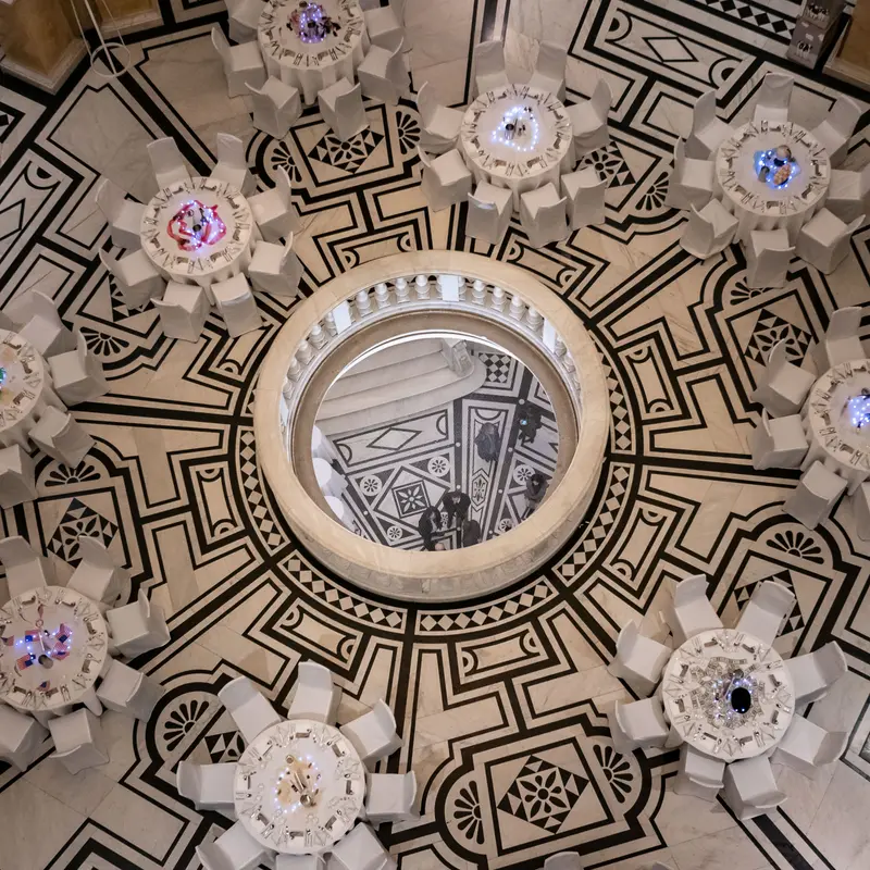 Intricate Geometric Ceiling Design with Luminous Floral Sculptural Elements