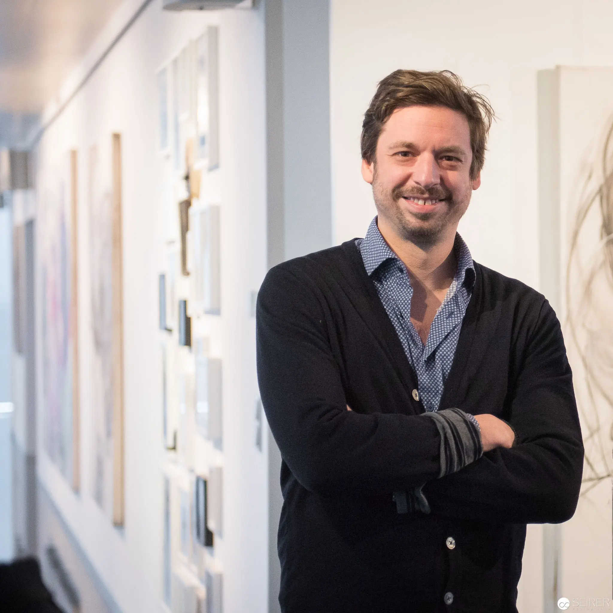 Stylianos Schicho Exhibition: Smiling Artist at Strabag Kunstforum Gallery Space