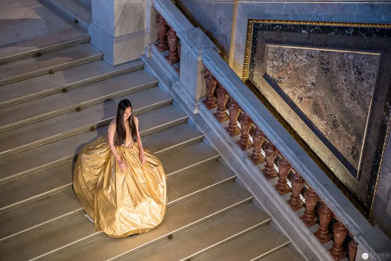 Golden Gown on Grand Staircase: Dramatic Pose at Kunsthistorisches Museum Wien
