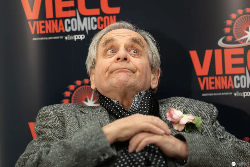 Sylvester McCoy's Expressive Pose at Vienna ComicCon 2018 Press Event