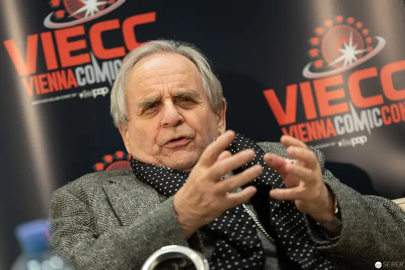 Sylvester McCoy Gesturing During VIECC Vienna ComicCon 2018 Interview