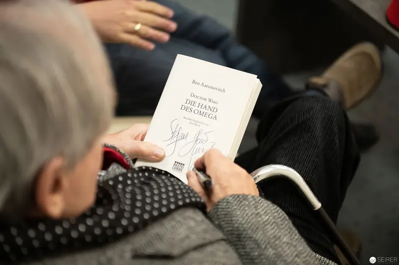 Sylvester McCoy Signing Autograph During VIECC 2018 Book Signing Session