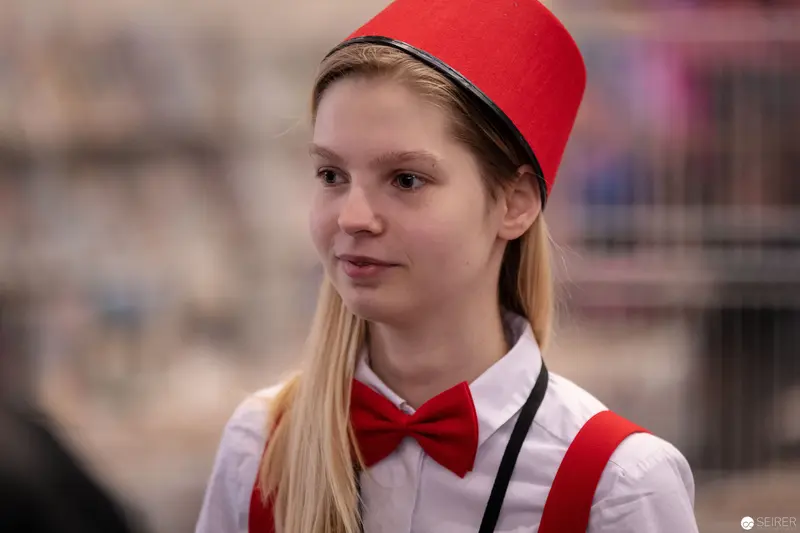 Young Performer in Red Fez and Bow Tie at Vienna ComicCon 2018