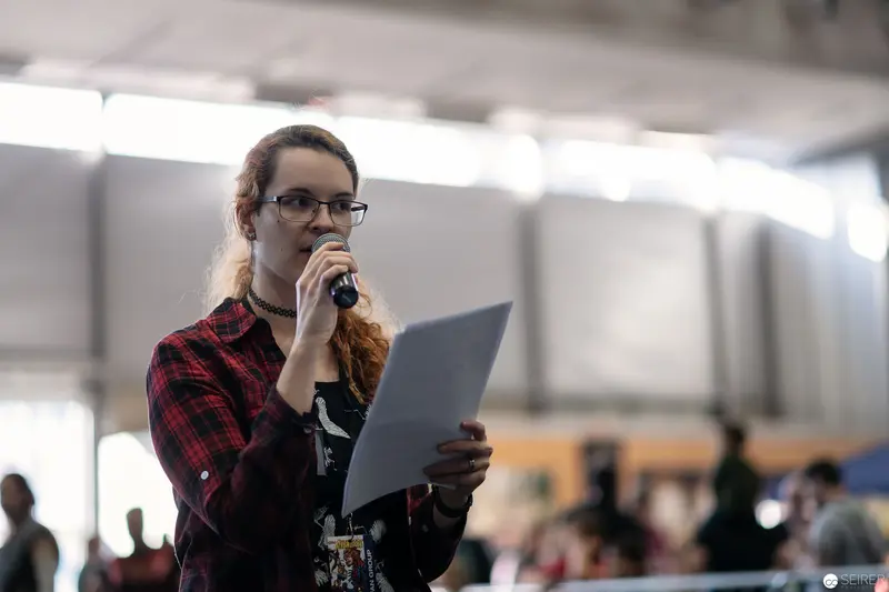 Speaker in Plaid Presenting at Vienna ComicCon 2018 Event
