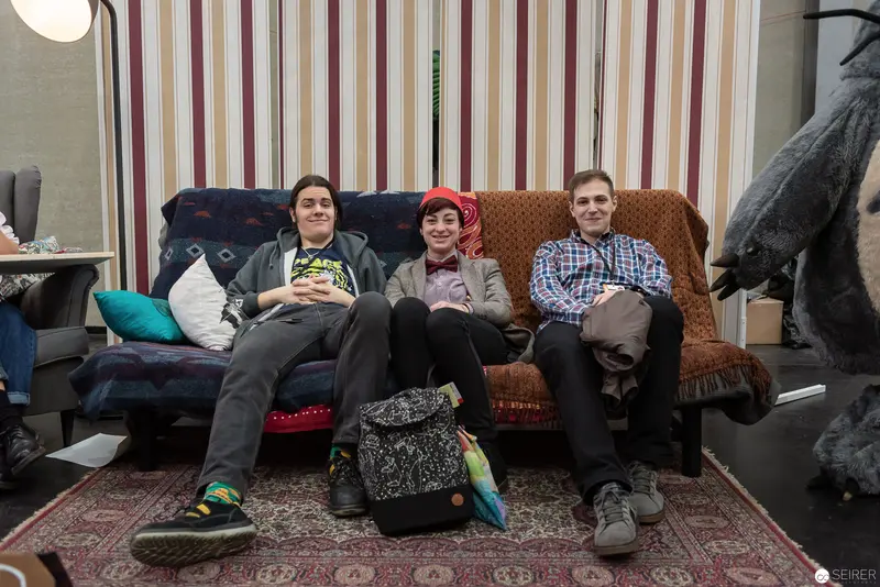 Three Costumed Attendees Relaxing at Vienna ComicCon 2018 Convention Space