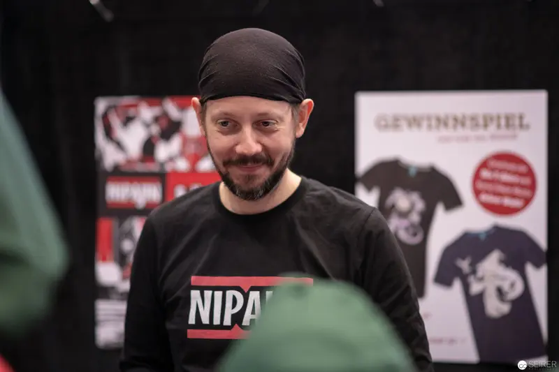 VIECC 2018 Attendee in NIPAF Merchandise Showcasing Event Branding