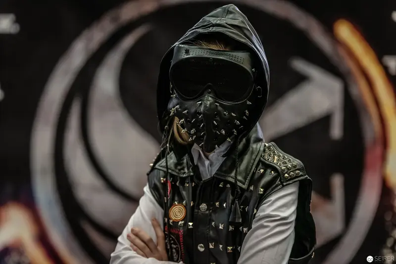 Costumed Figure in Dark Hooded Vest at Vienna ComicCon 2018