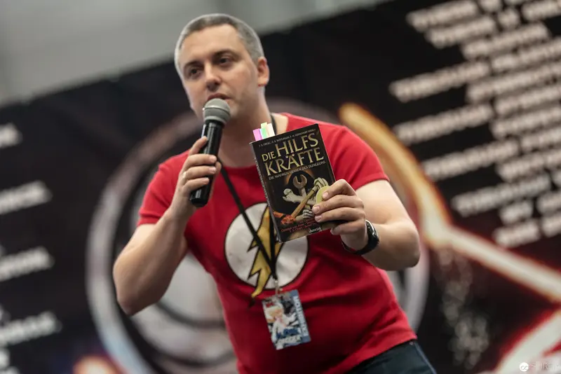 Speaker at VIECC 2018 Presenting Book on Comic Book Culture in Red Flash T-Shirt