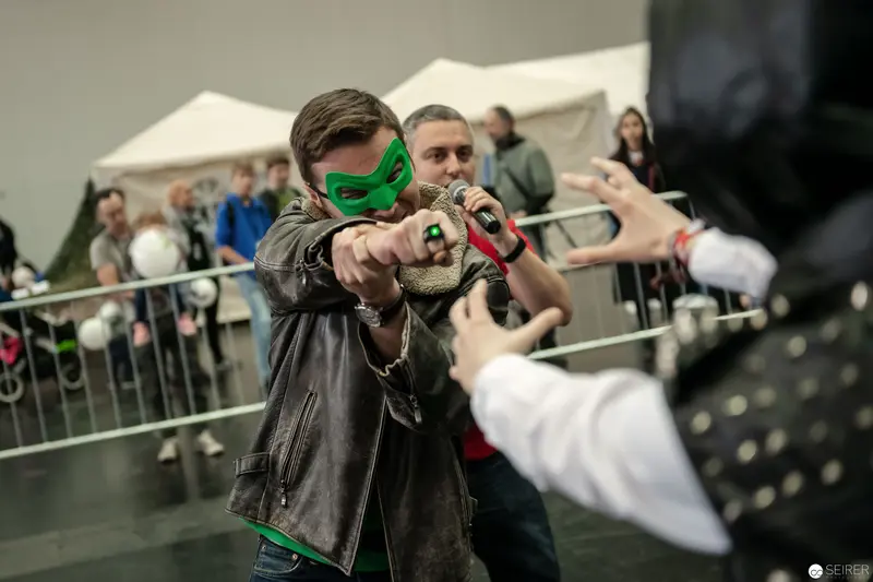 Costumed Participant Aiming Prop Weapon at Vienna ComicCon 2018