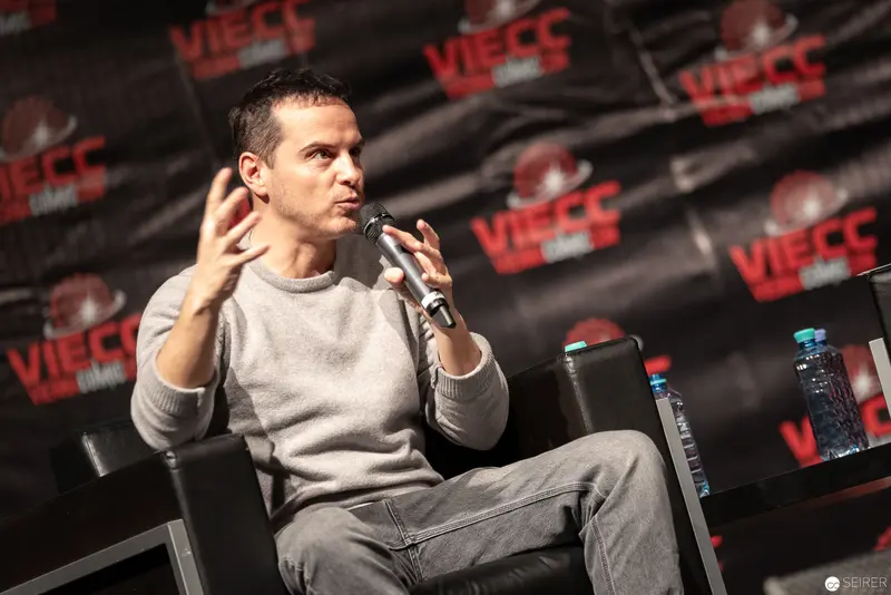Comic Convention Speaker Gesturing During Panel Discussion at VIECC 2018