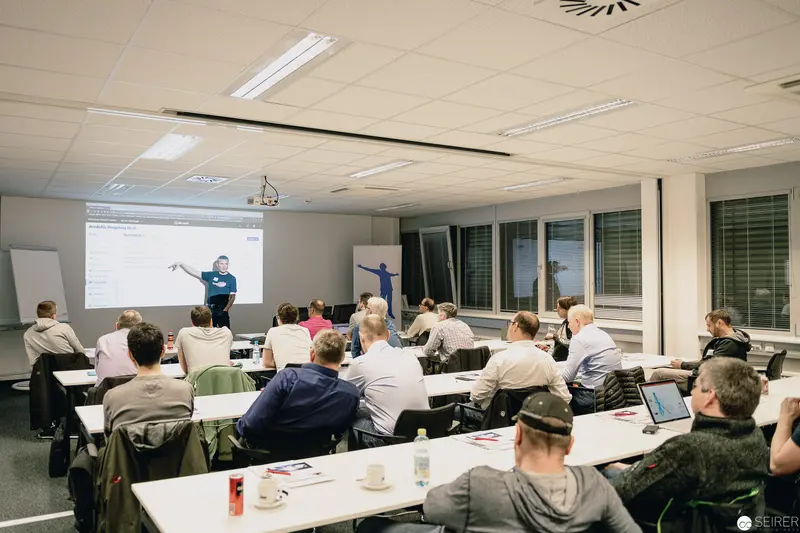 Professional Training Workshop with Instructor Presenting Data Projection