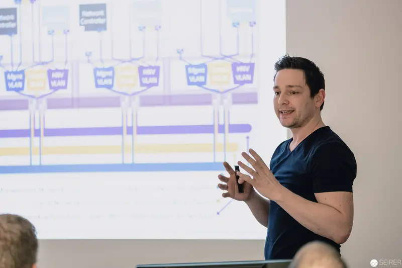 Software Engineer Presenting Technical Workflow Diagram in Corporate Training Session